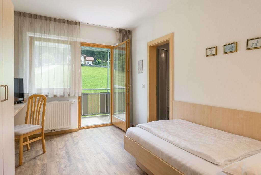 Postel nebo postele na pokoji v ubytování Garni Schorneck