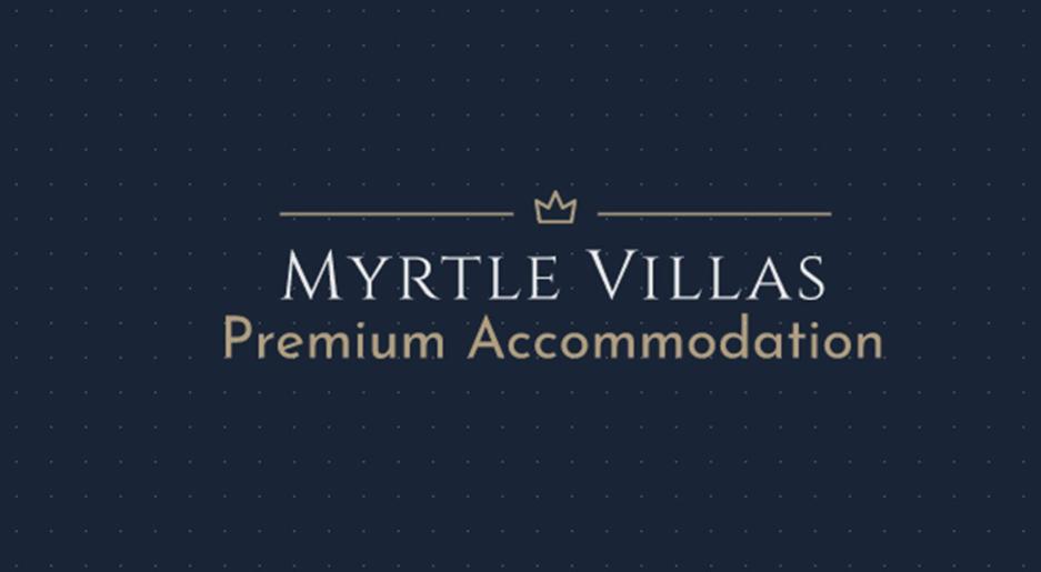 a logo for myrtle villas performingatomatom accommodation at Myrtle Villas in Hull