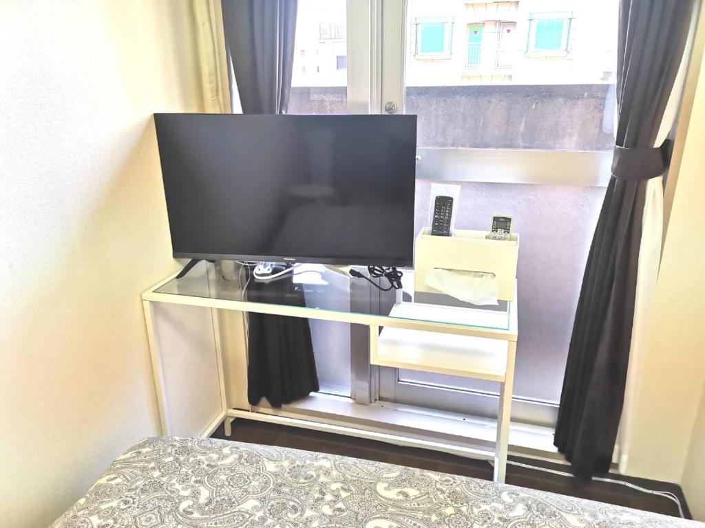 Una televisión o centro de entretenimiento en DP House