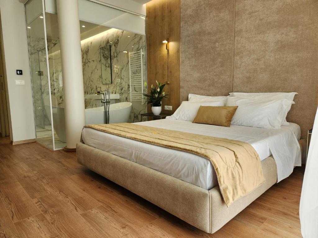 Postel nebo postele na pokoji v ubytování Hotel Gold