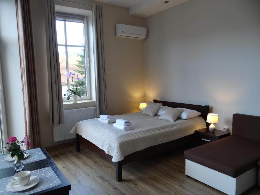 Posteľ alebo postele v izbe v ubytovaní The Lion Rooms