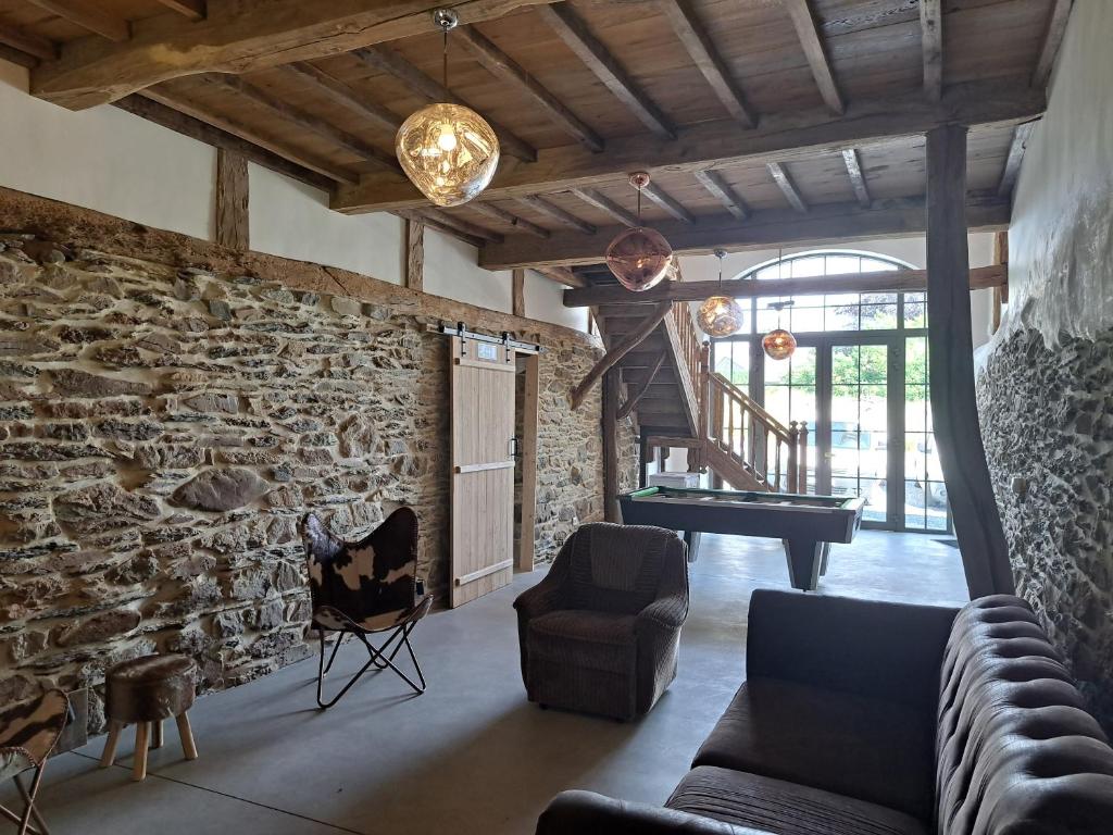 Posezení v ubytování Gîte Les 3 pierres