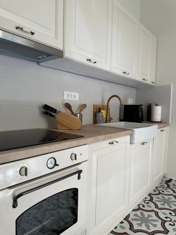 Кухня или мини-кухня в Syros casa

