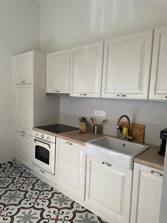 Кухня или мини-кухня в Syros casa
