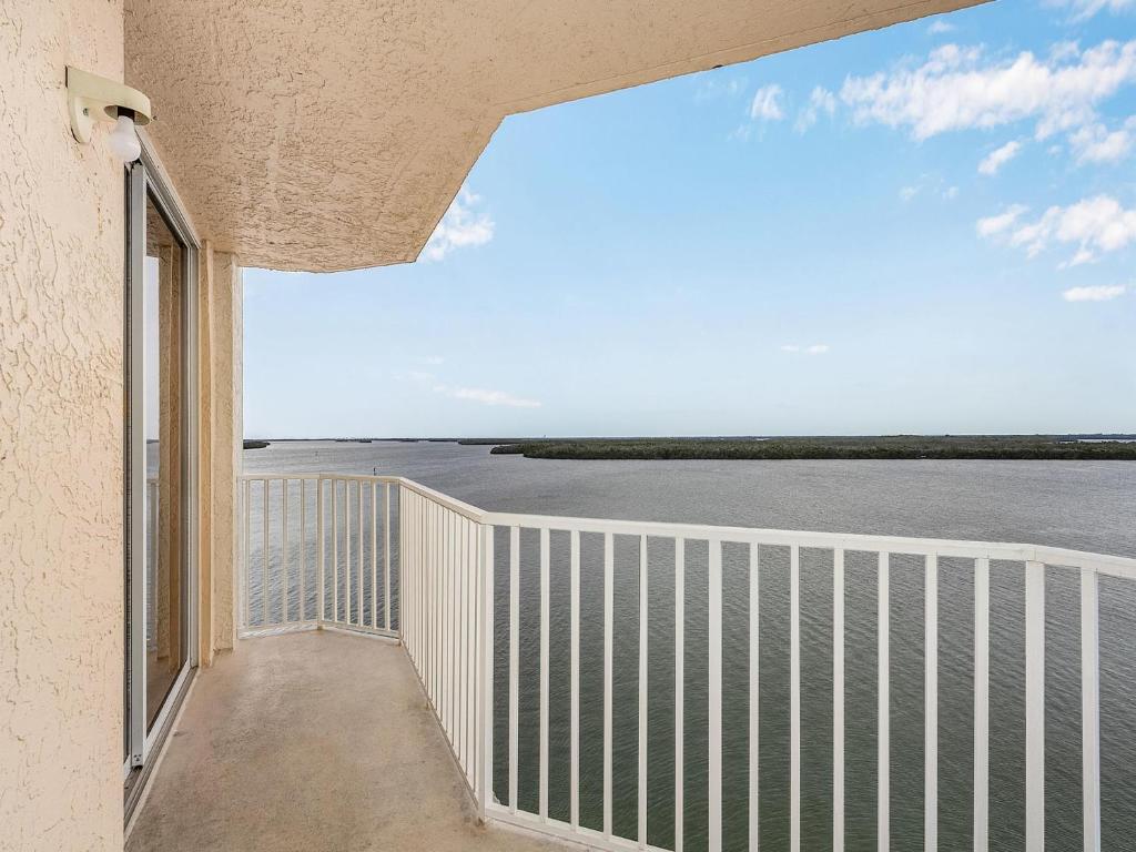 a balcony with a view of the ocean at Lovers Key Resort 503 - Fort Myers in Fort Myers Beach