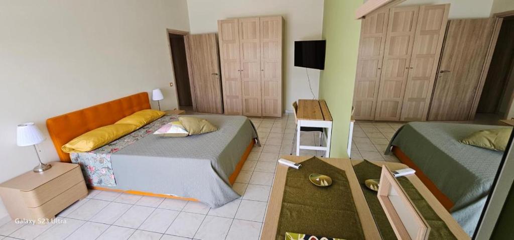 Postel nebo postele na pokoji v ubytování Le Cicas
