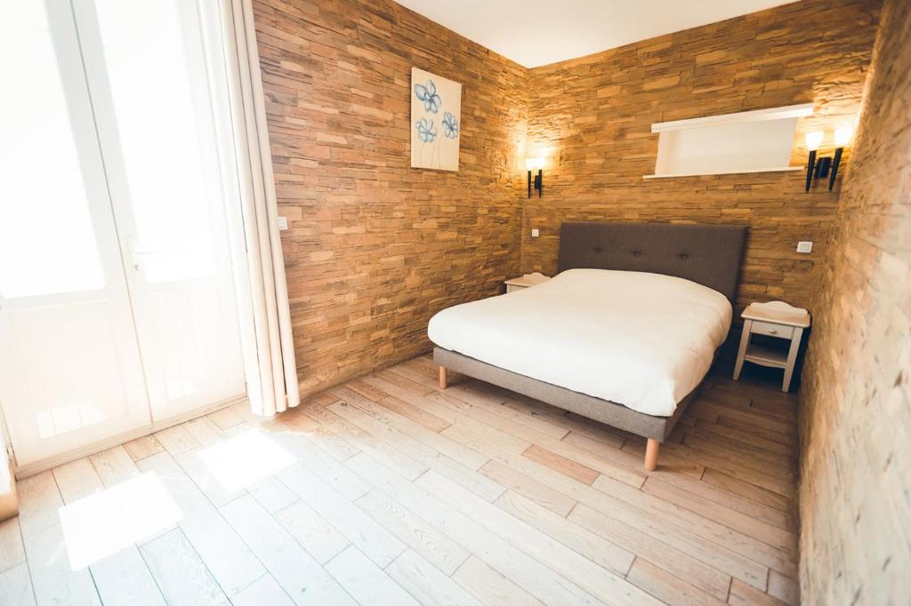 Postel nebo postele na pokoji v ubytování Marina D'oro
