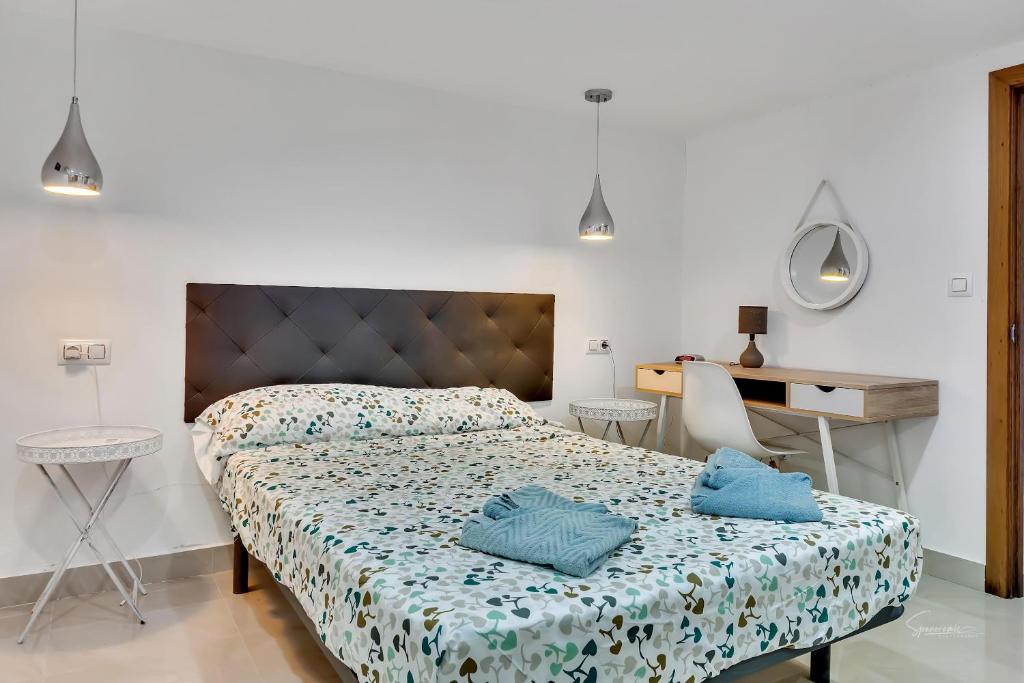 A bed or beds in a room at Casa Primera by Aldertons