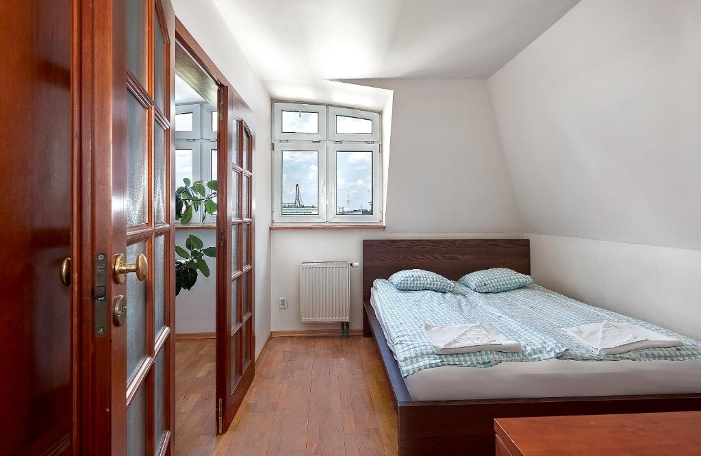 Posteľ alebo postele v izbe v ubytovaní Tatamka Hostel