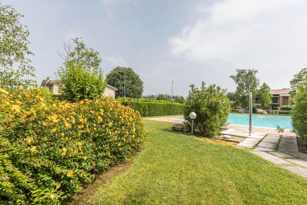Bazén v ubytovaní La Collina- Garda Lake alebo v jeho blízkosti