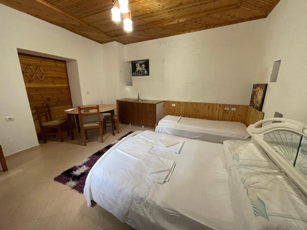 Postel nebo postele na pokoji v ubytování Guest House Bakuli