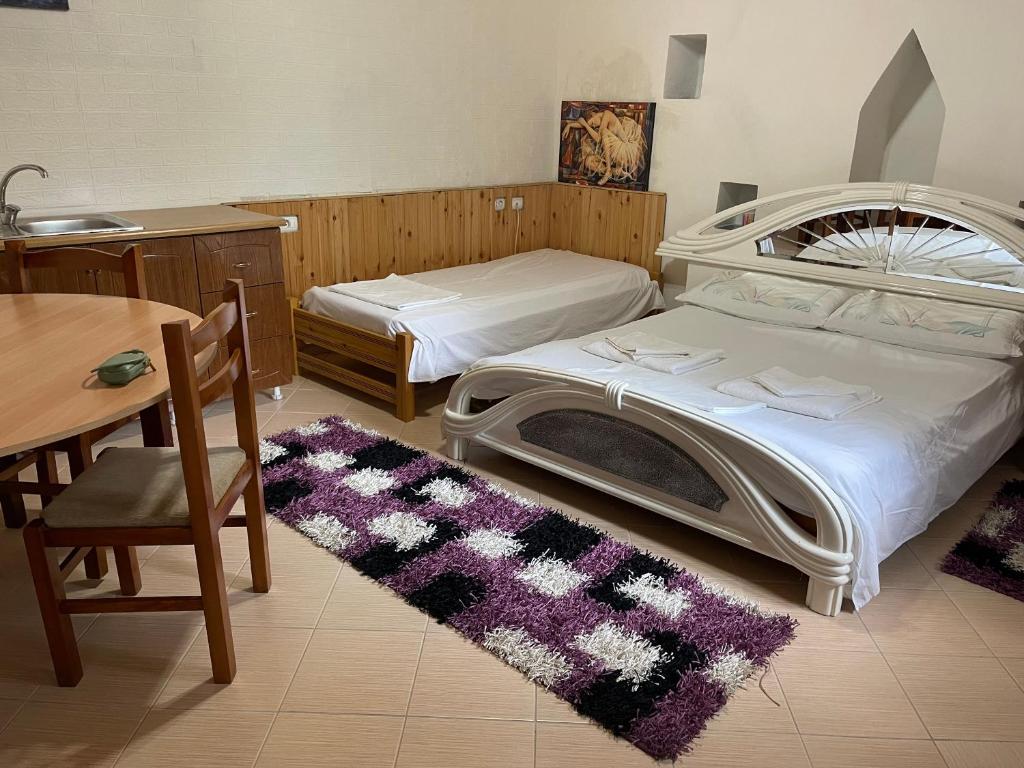 Postel nebo postele na pokoji v ubytování Guest House Bakuli