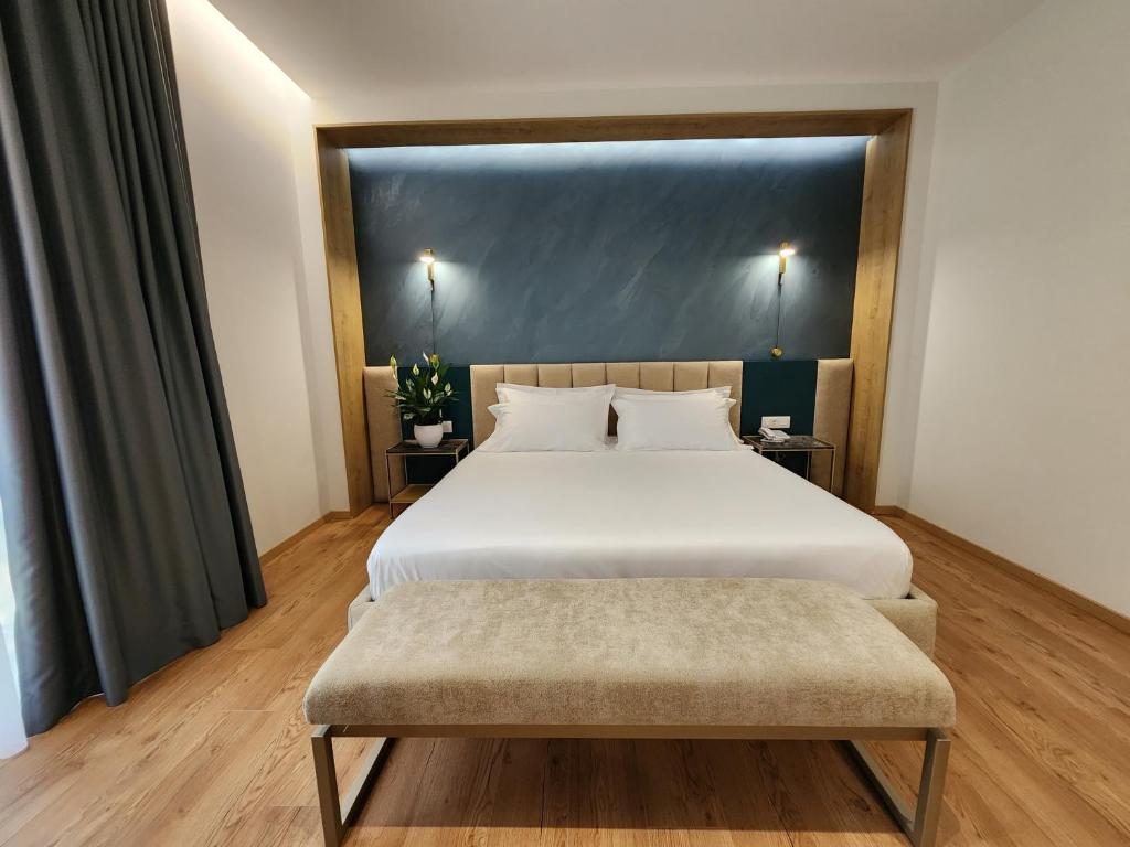 Postel nebo postele na pokoji v ubytování Hotel Gold
