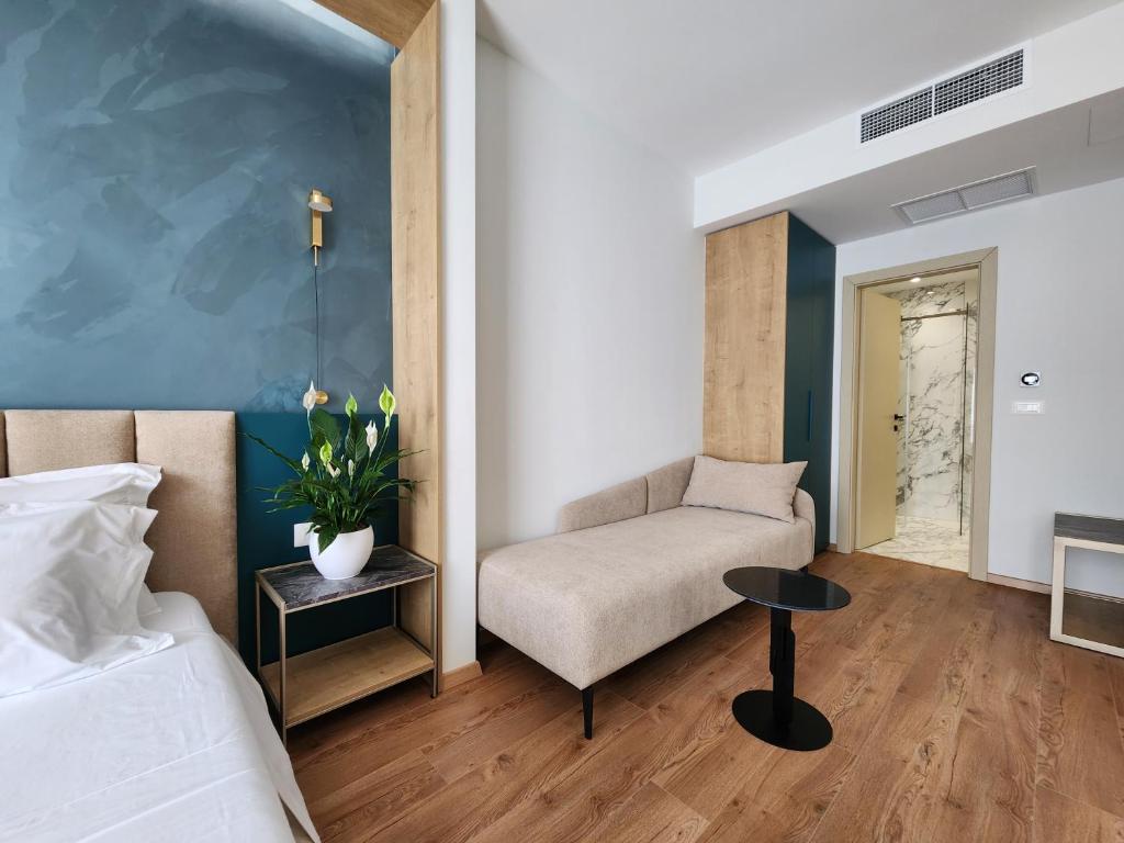 Postel nebo postele na pokoji v ubytování Hotel Gold