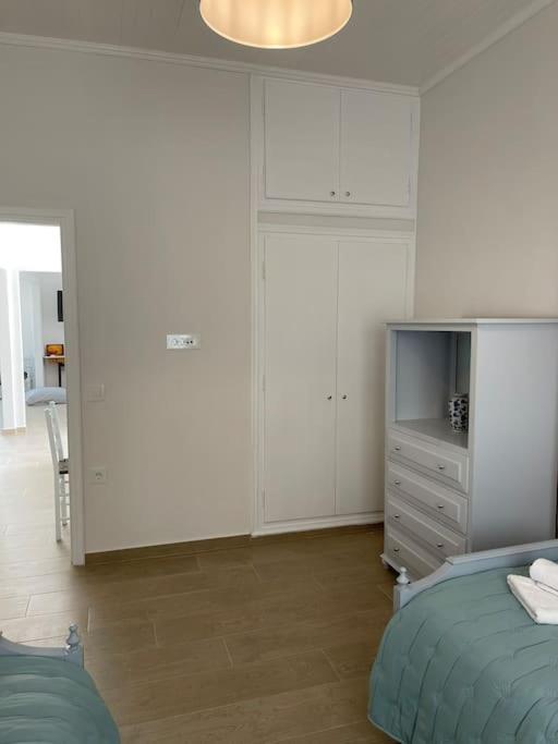 Postel nebo postele na pokoji v ubytování Nano's House Οροφοδιαμέρισμα στο κέντρο