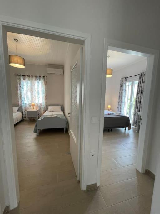 Postel nebo postele na pokoji v ubytování Nano's House Οροφοδιαμέρισμα στο κέντρο