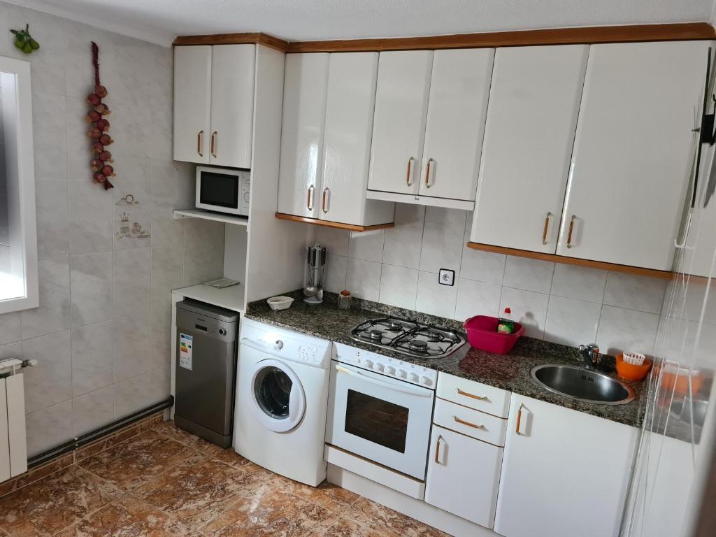 Kuchyň nebo kuchyňský kout v ubytování El BurbyI