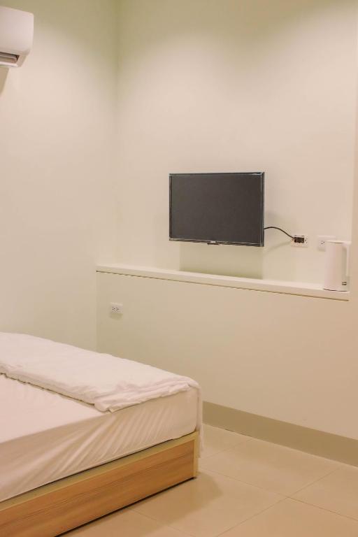 TV a/nebo společenská místnost v ubytování TETE Homestay