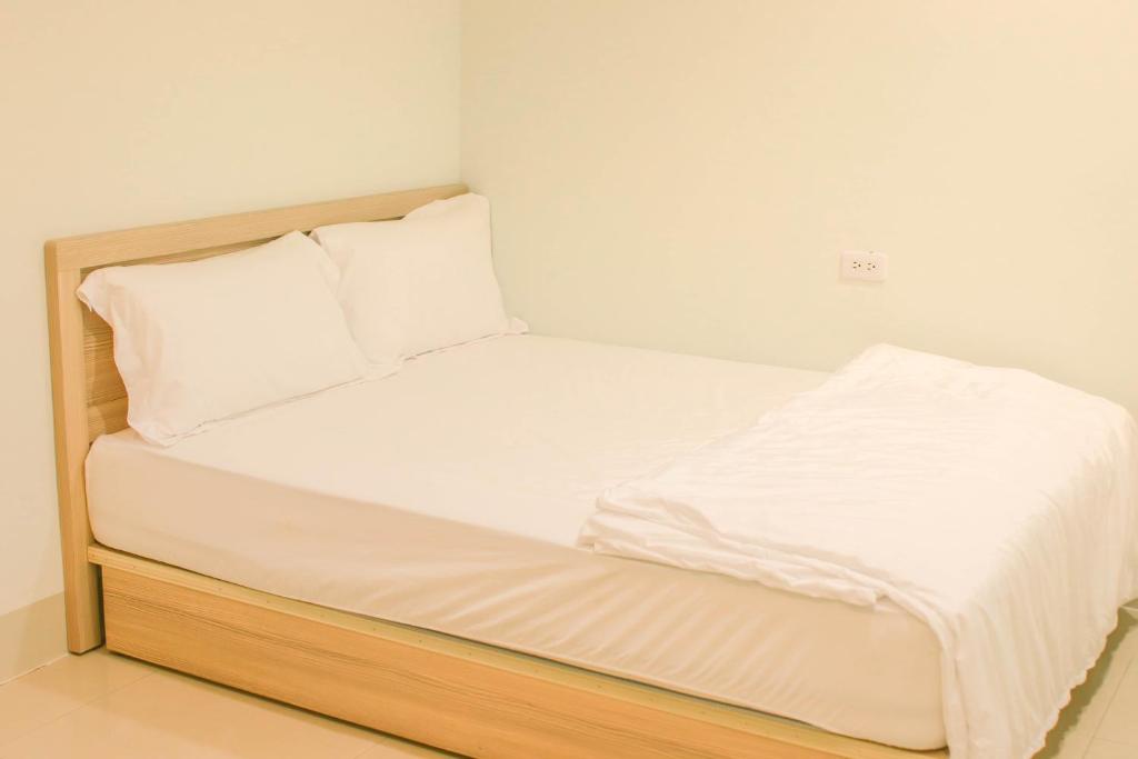 Postel nebo postele na pokoji v ubytování TETE Homestay