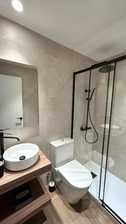Kúpeľňa v ubytovaní Casa con Jardín y Piscina Comunitaria