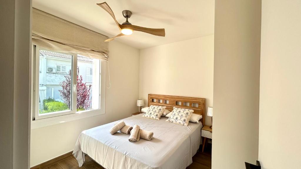 Posteľ alebo postele v izbe v ubytovaní Casa con Jardín y Piscina Comunitaria
