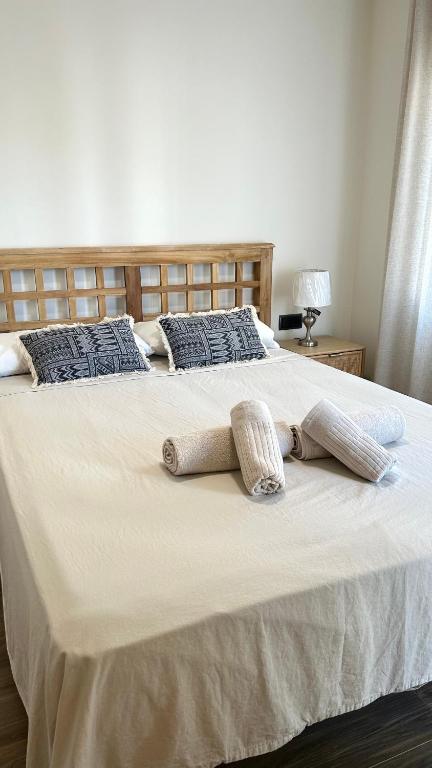 Posteľ alebo postele v izbe v ubytovaní Casa con Jardín y Piscina Comunitaria