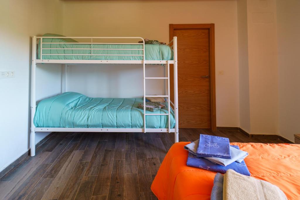 Postel nebo postele na pokoji v ubytování Casa Barambán
