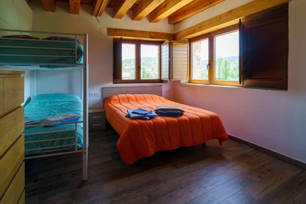 Postel nebo postele na pokoji v ubytování Casa Barambán