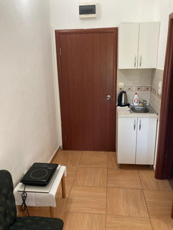 O bucătărie sau chicinetă la Guest House Andrea