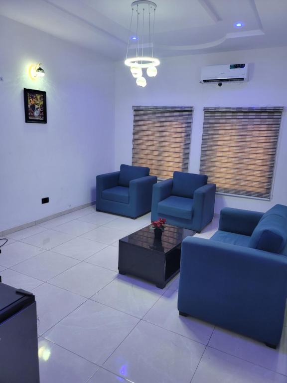 Posezení v ubytování Treasure Park & Garden, Golf Estate. Simawa