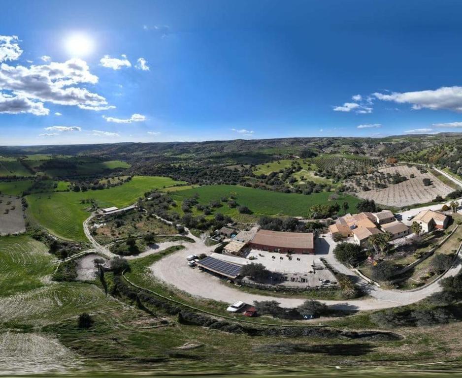 an aerial view of a farm with a house at Agriturismo Giannavi in Palazzolo Acreide