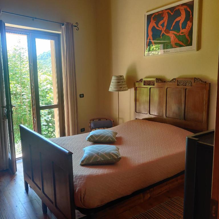 Postel nebo postele na pokoji v ubytování Chalet Morier