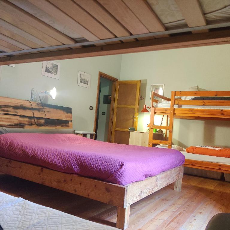 Postel nebo postele na pokoji v ubytování Chalet Morier