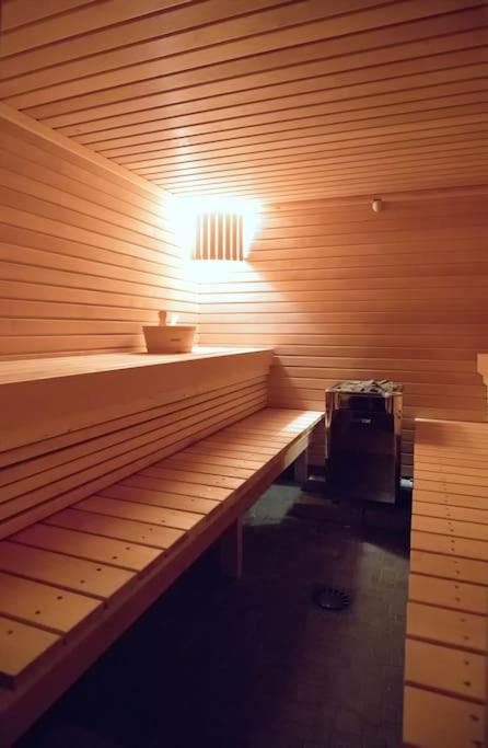 a wooden sauna with a light on top of it at HaKaJu Appartement 10 personnes à Val Cenis in Lanslebourg-Mont-Cenis