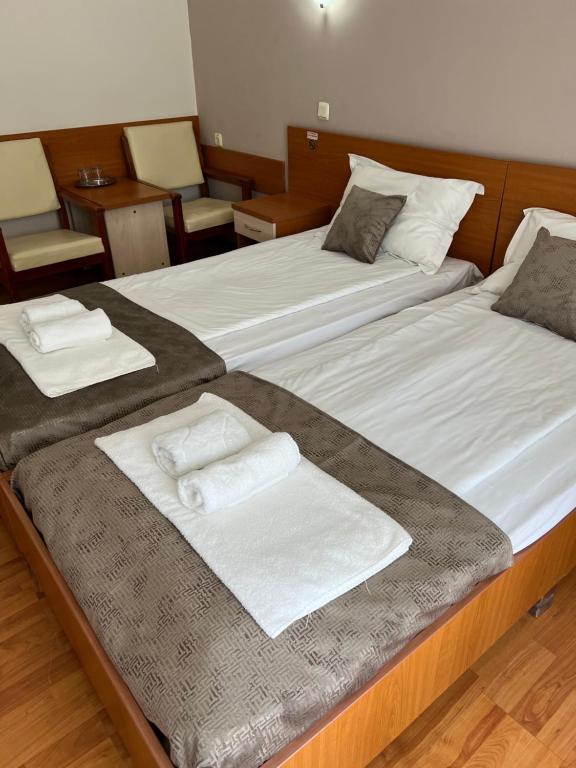 Postel nebo postele na pokoji v ubytování Hotel Violeta