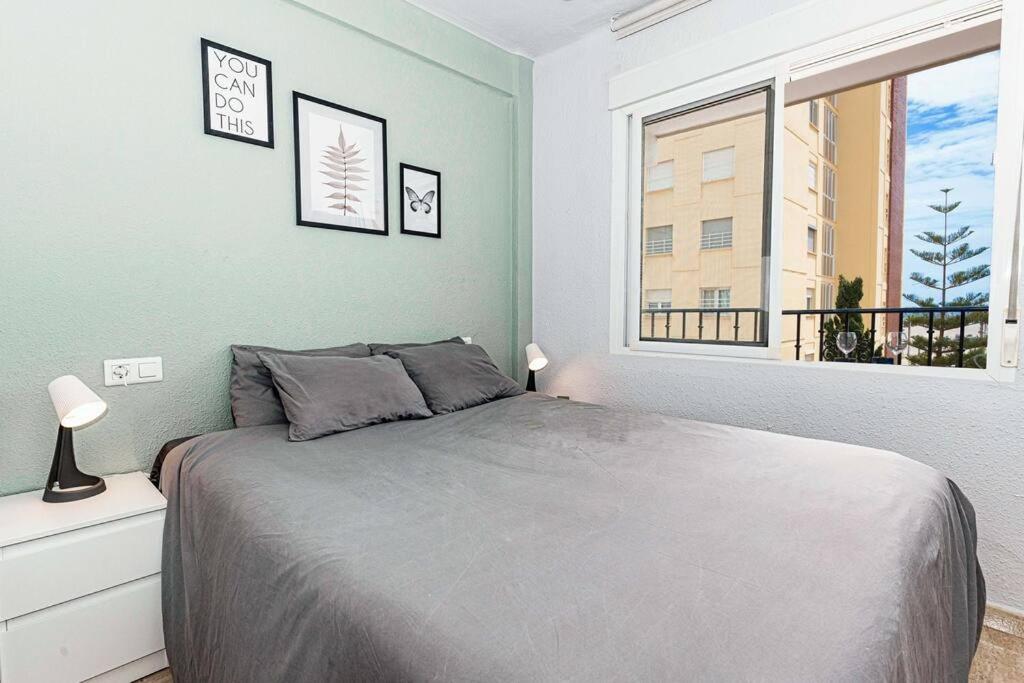 Postel nebo postele na pokoji v ubytování Sea Apartment Torre del Mar