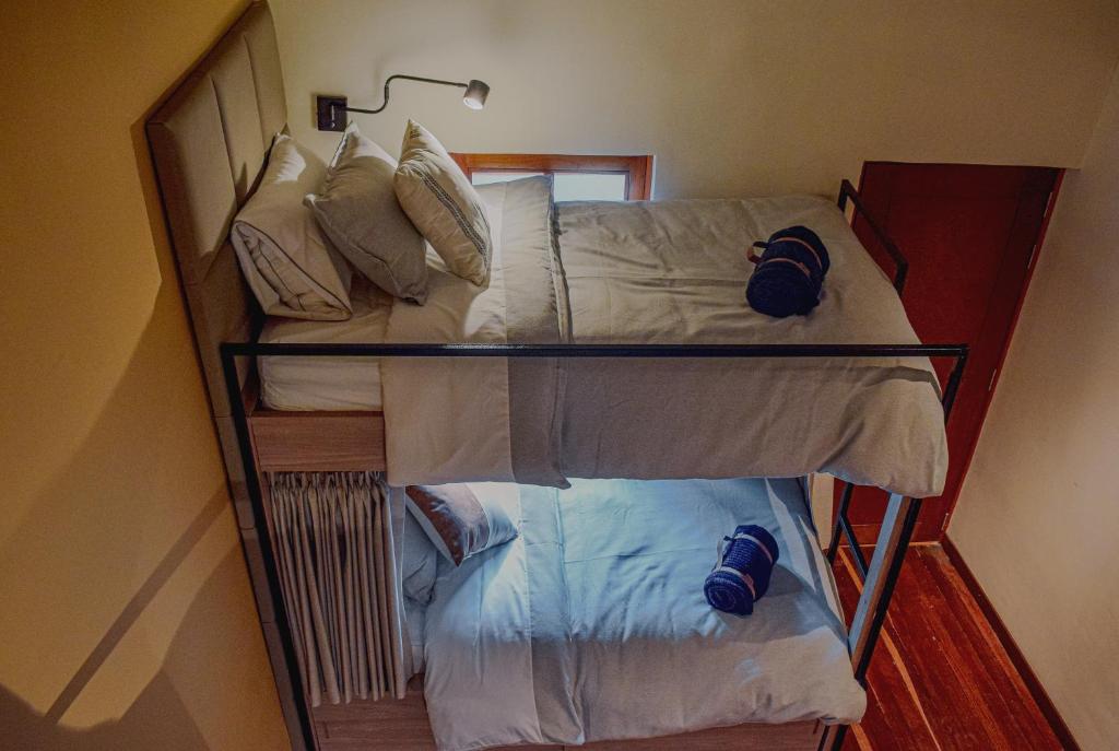 Postel nebo postele na pokoji v ubytování Casa Dreamer Bogotá