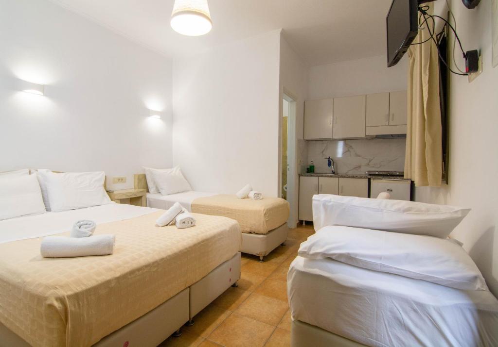 Ένα ή περισσότερα κρεβάτια σε δωμάτιο στο Phevos Villa