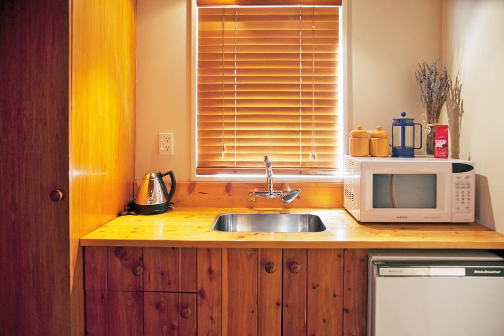 Kuchyň nebo kuchyňský kout v ubytování Te Wanaka Lodge