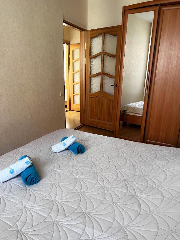 Postel nebo postele na pokoji v ubytování Apartment Jūros Mėlis