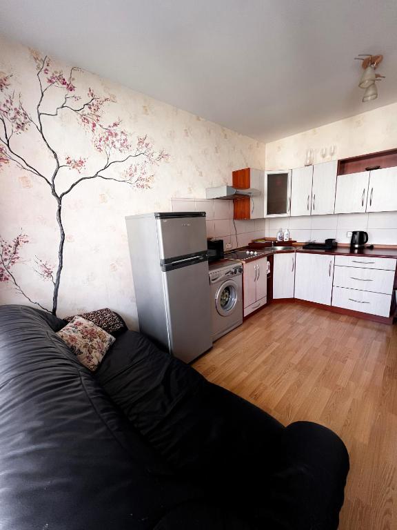 Kuchyň nebo kuchyňský kout v ubytování Apartment Jūros Mėlis