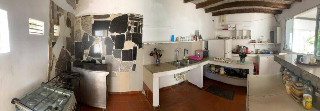 Kuchyň nebo kuchyňský kout v ubytování Casa Maya Playa El Yaque