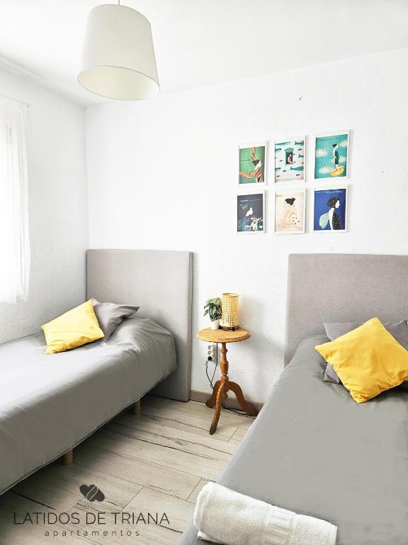 Postel nebo postele na pokoji v ubytování Latidos de Triana - Apartamento en Triana totalmente equipado