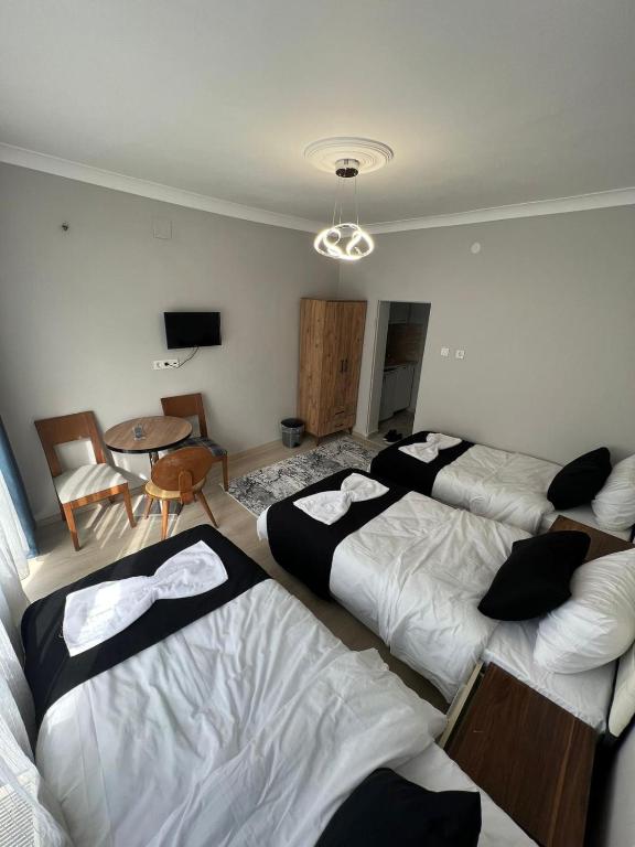 Postel nebo postele na pokoji v ubytování Taksim Millennium Suit Hotel