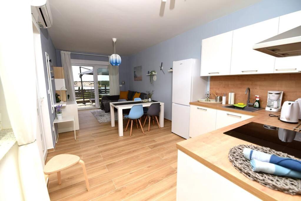 Kuchyň nebo kuchyňský kout v ubytování Apartman Eva