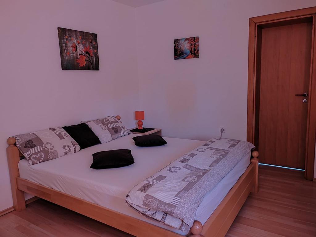 Posteľ alebo postele v izbe v ubytovaní Stari mlin