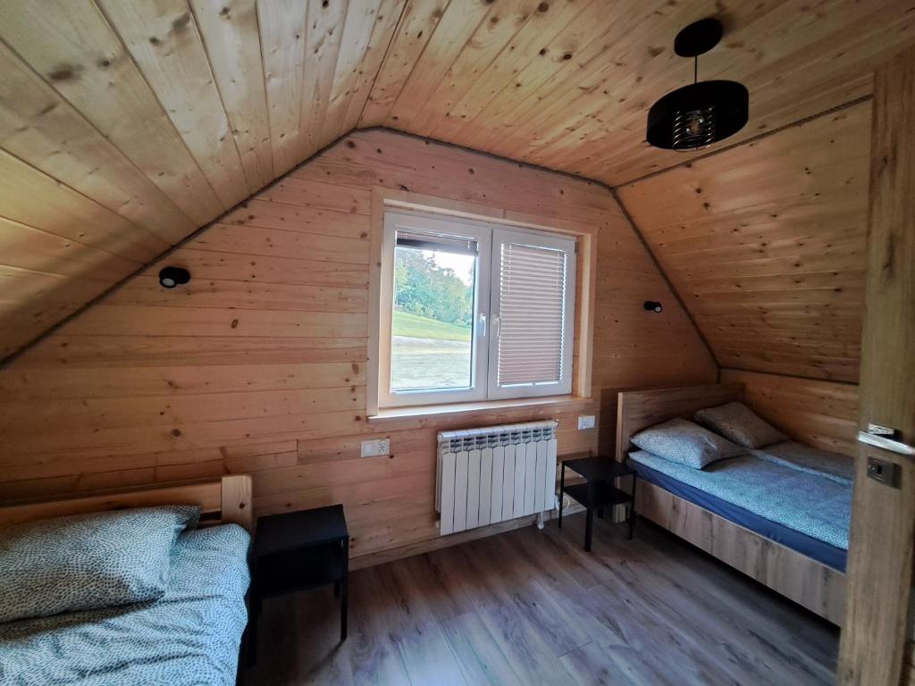 Postel nebo postele na pokoji v ubytování Domki w Bieszczadach Nowa Zelandia