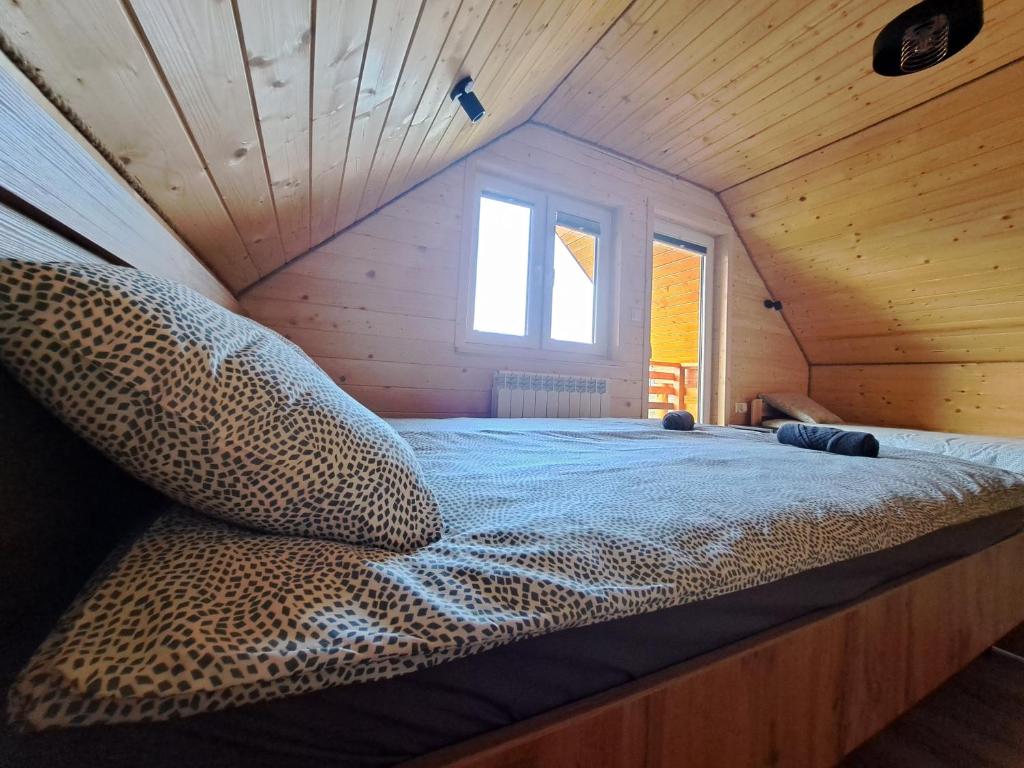 Postel nebo postele na pokoji v ubytování Domki w Bieszczadach Nowa Zelandia