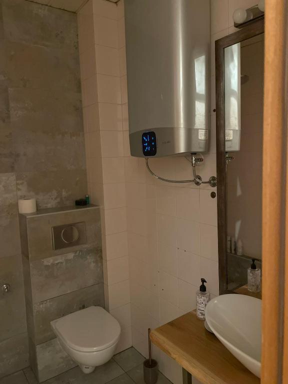 Vannituba majutusasutuses Corso Apartment