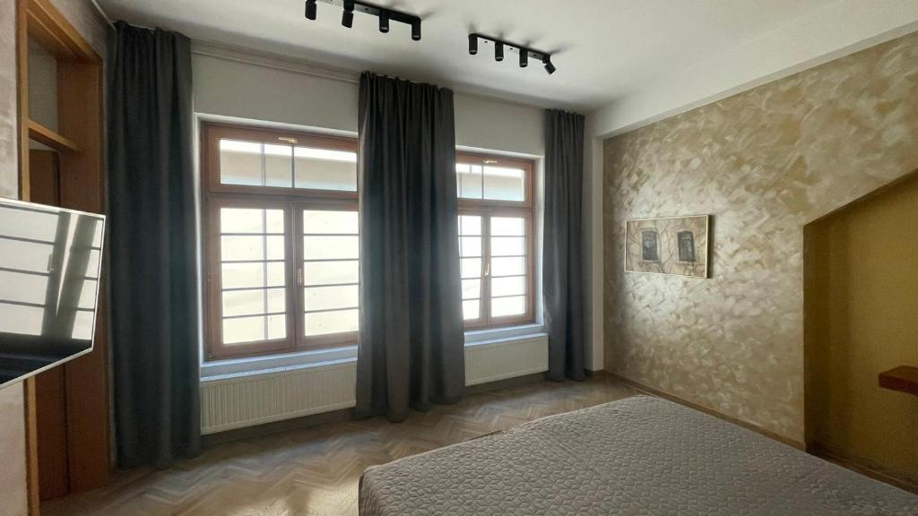 Voodi või voodid majutusasutuse Corso Apartment toas